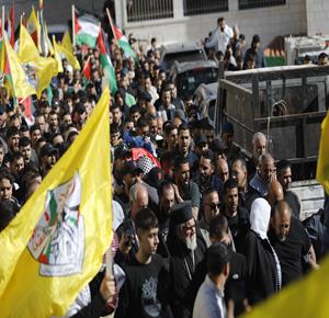 تشييع جثمان الشهيد عودة عواودة (25 عاما)، في بلدة دير دبوان شرق رام الله