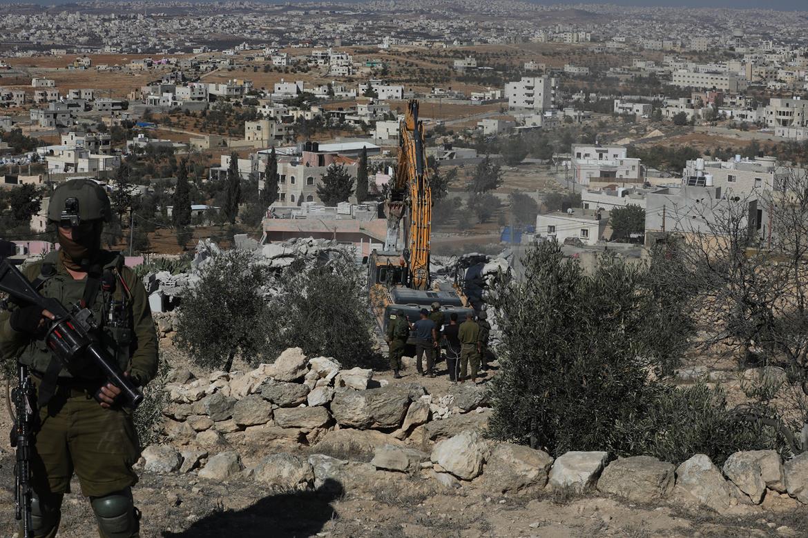 الاحتلال يهدم منزلا في يطا جنوب الخليل يوم الثلاثاء الماضي (عدسة: مشهور وحواح/وفا)